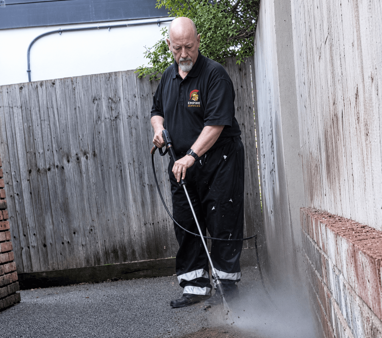 George from Empire Clean pressure-washing a property in Kent